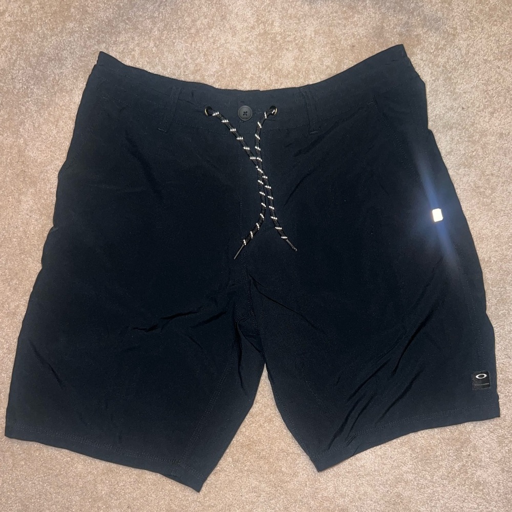 Oakley black swim trunks, size 34